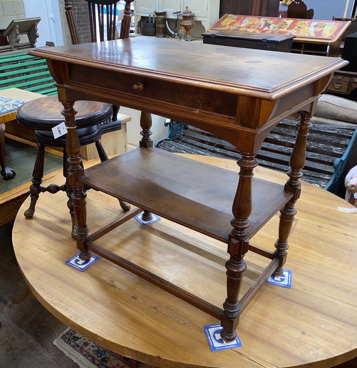 A French walnut two tier side table, Height - 75cm, Width - 75cm, Depth - 50cm